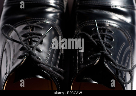 Des Mannes Schuhe Stockfoto