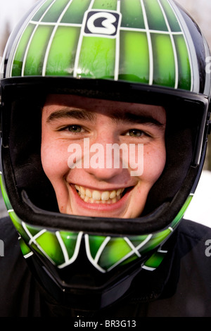 Porträt eines Mannes Motorschlitten in Maine. (Nahaufnahme) Stockfoto