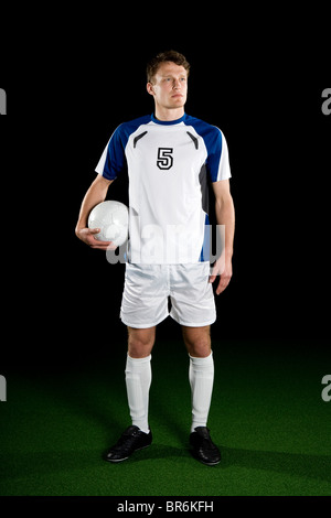 Ein Fußballspieler, Portrait, Studio gedreht Stockfoto