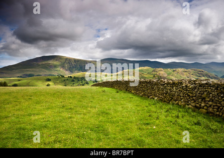 View of the Lake District hills and landscape from a field near Keswick, Cumbria, England, UK Stockfoto