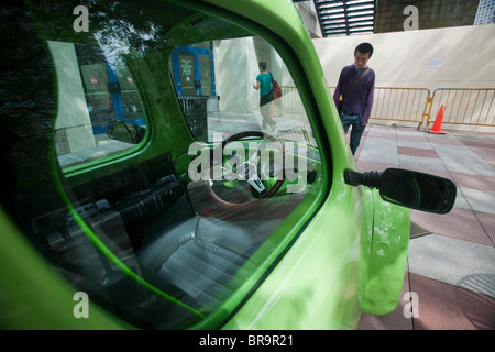 Ein dreirädriges Myers Motors NmG persönliche Elektrofahrzeug an der Fordham University in New York Stockfoto