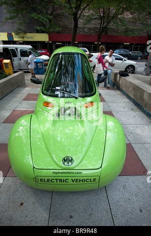 Ein dreirädriges Myers Motors NmG persönliche Elektrofahrzeug an der Fordham University in New York Stockfoto