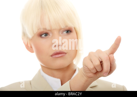 Junge schöne Geschäftsfrau macht auf abstrakte Bildschirm wählen Stockfoto