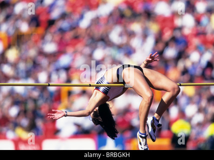 Weiblich-Hochspringerin löscht Bar auf ihren Sprung Stockfoto