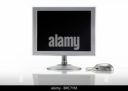 Silber LCD-Monitor mit Maus Stockfoto