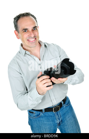 Porträt eines männlichen Fotografen mit Kamera isoliert auf weißem Hintergrund Stockfoto