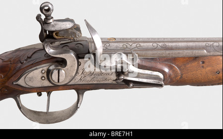 Eine Flintlock-Pistole, Johann Andreas Kuchenreuter, Steinweg bei Regensburg, um 1800. Rundes Damaszener Fass mit Mikronut im Kaliber 12 mm. Silberner Rückblick und faltbares zweiteiliges Bügeleisen. Die Oberseite des Fasses trägt einen reichen silberfarbenen Schriftrollenschmuck und die Signatur "I. Andreas Kuchenruter." Über der Breech Ist Die Zahl "2" beschriftet, die ebenfalls ein goldenes Reiter-Kennzeichen hat. Eisernes Winderschloss mit einer weiteren Unterschrift auf der Sperrplatte. Rollenmontierte Kühlschränke. Einfacher Trigger. Geschnitzter Walnussbestand mit einer Nasenkappe aus Horn und Eisenmöbeln. Stockfoto