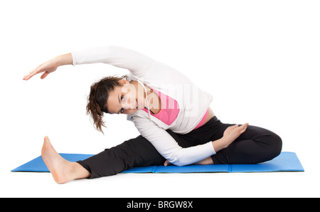 flexible junge Frau Körper isoliert auf weiss Stockfoto