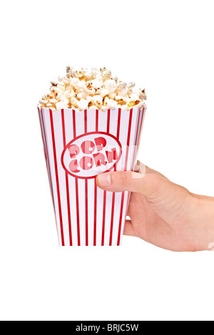 Eine Hand voll Popcorn-box Stockfoto