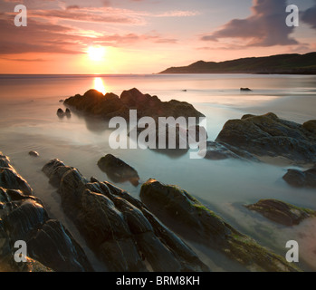 Sonnenuntergang am Barricane Strand, Woolacombe, Devon, England. Sommer (Juni) 2010. Stockfoto