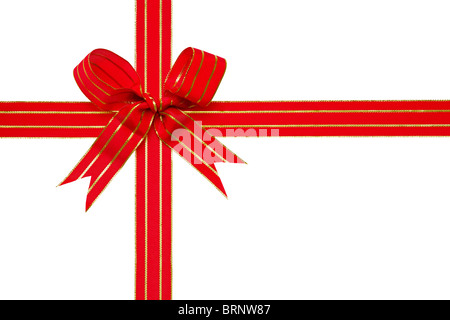 Foto von einem rot-goldenen Band gebunden in einem Bogen isoliert auf weißem Hintergrund mit Beschneidungspfad, ideal für Geschenk-Themen. Stockfoto