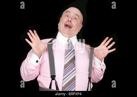 im mittleren Alter Geschäftsmann mit einem verrückten Gesichtsausdruck dösen Stockfoto