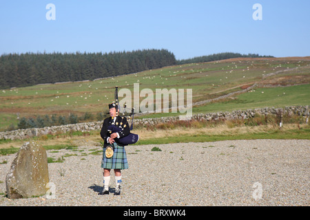 Aufnahme eines traditionellen schottischen Dudelsack-Spieler Dudelsack außerhalb bei einer Hochzeit an der Westküste von Schottland Stockfoto