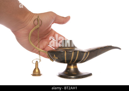 Reiben eine alte Wunderlampe Studio Ausschnitt Stockfoto