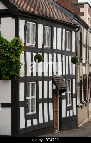 -Markt halbe Fachwerkhaus Altbauten in der kleinen Stadt von Wem in Shropshire, England. Stockfoto