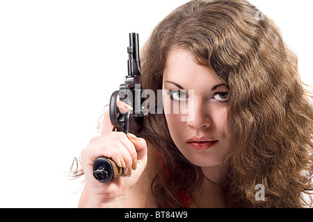 Junge Frau mit einer Pistole. Isoliert auf weiss Stockfoto