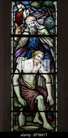 Ein Glasfenster, die Darstellung der barmherzige Samariter, Challacombe Kirche, Devon Stockfoto