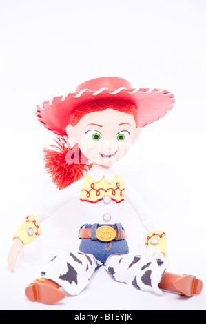 Eine Nahaufnahme Foto von Kinder Spielzeug Jessie Charakter aus den Toy Story Filmen vor einem weißen Hintergrund Stockfoto