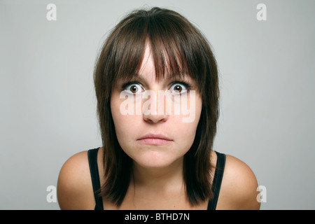 Eine verängstigte Frau Stockfoto