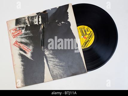 Die Rolling Stones 'Sticky Fingers" Vinylschallplatte und Albumcover. Stockfoto