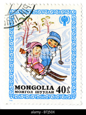 Mongolei - CIRCA 1980: Eine Briefmarke gedruckt in Mongolei zeigt Bild des Kindes, circa 1980. Stockfoto