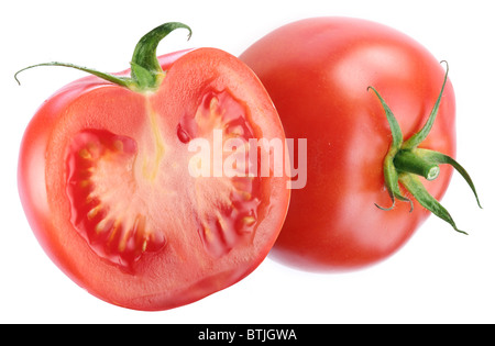 Tomaten und die Hälfte eines. Isoliert auf weißem Hintergrund. Stockfoto