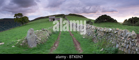 Sonnenuntergang am Wind Hill Eisenzeit Wallburg (Countisbury Hill) in der Nähe von Lynmouth, Exmoor National Park, North Devon, England, UK Stockfoto
