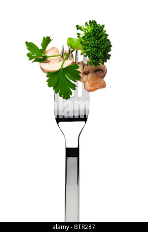 vorbereitet, Chamoignón Champignons und gedünsteten Brokkoli kleben auf einer Gabel, garniert mit Petersilie, Ausschnitt Stockfoto