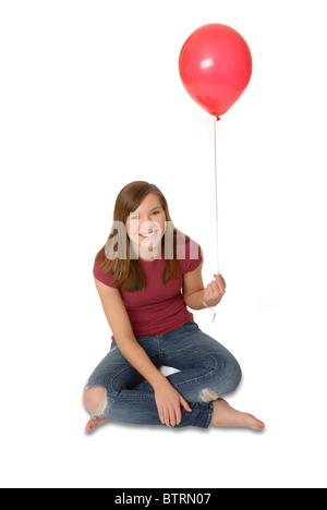 Teenager-Mädchen halten Ballon. Stockfoto