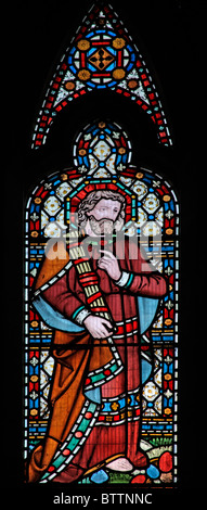 Ein Buntglasfenster von Alexander Gibbs (1867), das Isaac, Sohn Abrahams, Kirche St. Peter und St. Paul, Heytesbury, Warminster, Wiltshire, darstellt Stockfoto