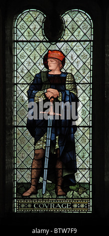 Ein Glasfenster von Edward Burne-Jones Darstellung Mut, Malmesbury Abbey, Wiltshire Stockfoto