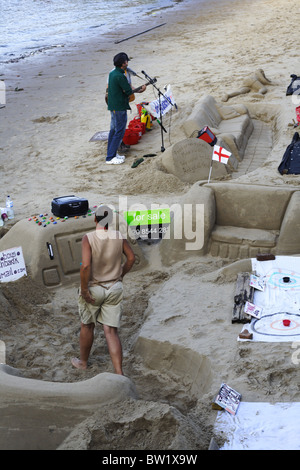 Sand Künstler durch den Fluss Themse in london Stockfoto