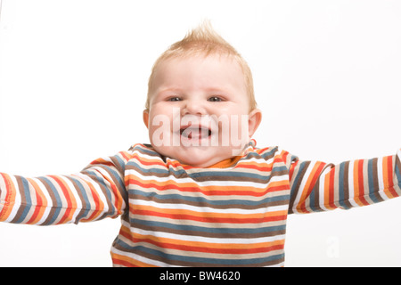 Expressive niedlichen kleinen Jungen isoliert auf weißem Hintergrund. Stockfoto