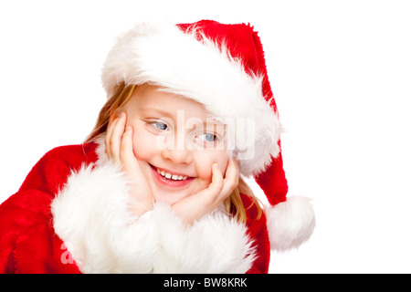 Kleines Mädchen verkleidet als Weihnachtsmann lächelt glücklich.  Isoliert auf weißem Hintergrund. Stockfoto