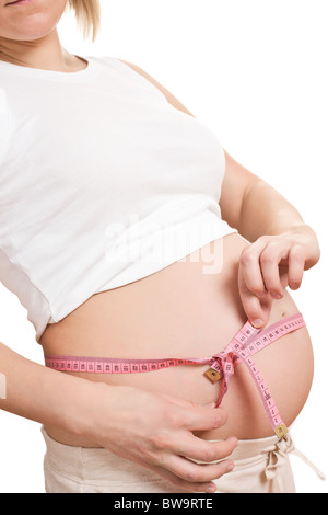 Studioaufnahme von schwangeren misst Bauch Stockfoto