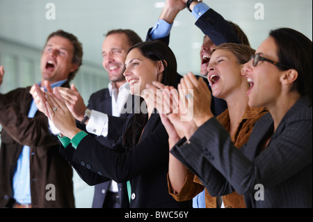 Business-Team applaudieren, Lächeln Stockfoto