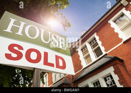 Haus verkauft im Voraus Stockfoto