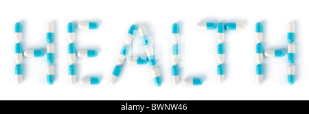Wort Gesundheit gemacht aus blau weiß Medikamente Kapseln isoliert auf weißem Hintergrund Stockfoto