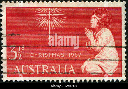 Australien - CIRCA 1957: A Christmas Stempel gedruckt in Australien zeigt ein Bild von einem Mädchen beten zu einem Stern, ca. 1957 Stockfoto