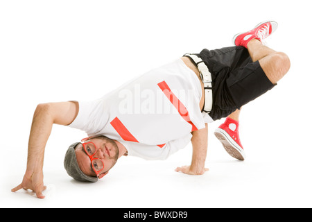 Foto von kluger Mann Durchführung Breakdance Stockfoto
