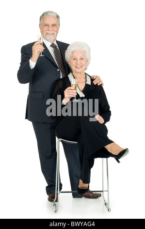 elegante älteres Ehepaar Toasten Stockfoto