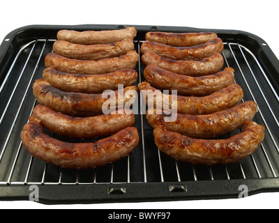 Eine Grillpfanne zubereitet Schweinswürstl - isoliert auf weiss Stockfoto