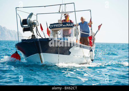 Fischer auf Fischerbooten Stockfoto