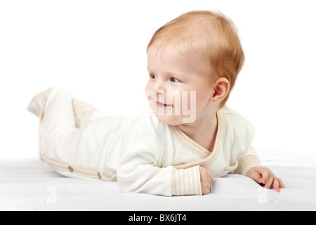 Glückliches Baby Lächeln auf den Lippen. Isoliert auf weißem Hintergrund. Stockfoto