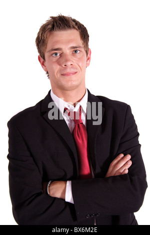 Ein zuversichtlich Geschäftsmann vor weißem Hintergrund steht. Stockfoto