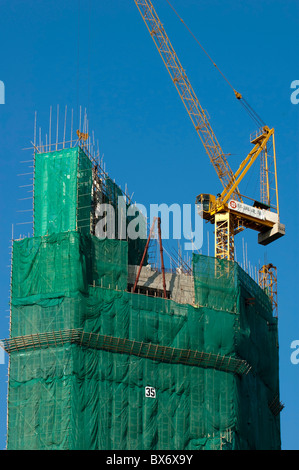 Bambus-Gerüst verwendet für den Bau von einem Wolkenkratzer, Kowloon, Hong Kong, China. Stockfoto
