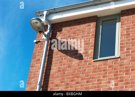 Straßenbeleuchtung auf Gehäuse in den Süden Lynn Millennium Gemeindeentwicklung in Kings Lynn. Stockfoto