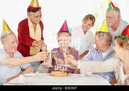 Ältere Frau-Geburtstags-party Stockfoto