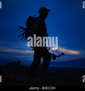 Pfeil und Bogen-Jäger Stockfoto