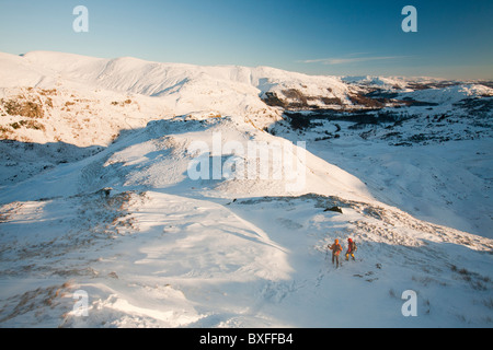 Kletterer über Grasmere im Lake District, Großbritannien. Stockfoto